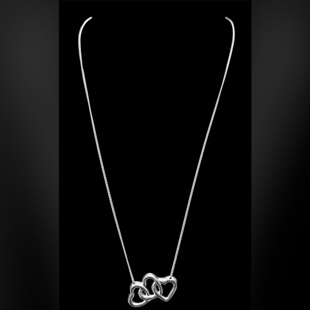TIFFANY & Co., Triple heart pendant in sterling silver